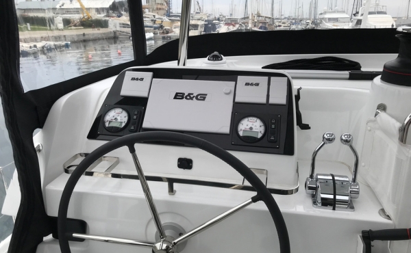 lagoon-42-steering 4_lagoon-42-steering Superychts For Sale. - Lagoon 42 - Sunrise | Family Sailing Catamaran Charter